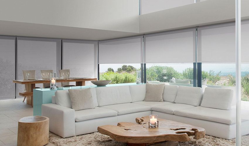 Modern living room curtains and roller blinds UAE
